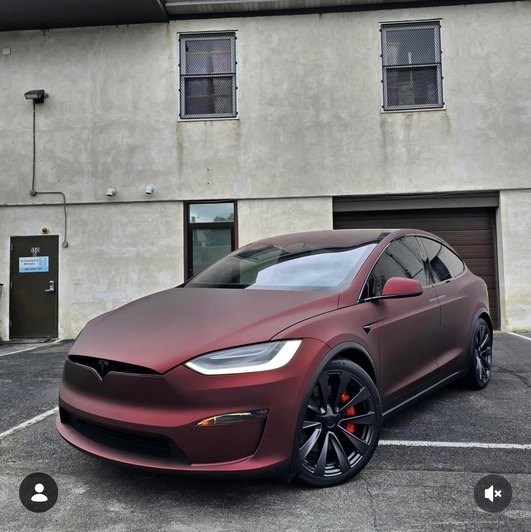 Maroon Tesla Model X wrapped in KPMF vinyl