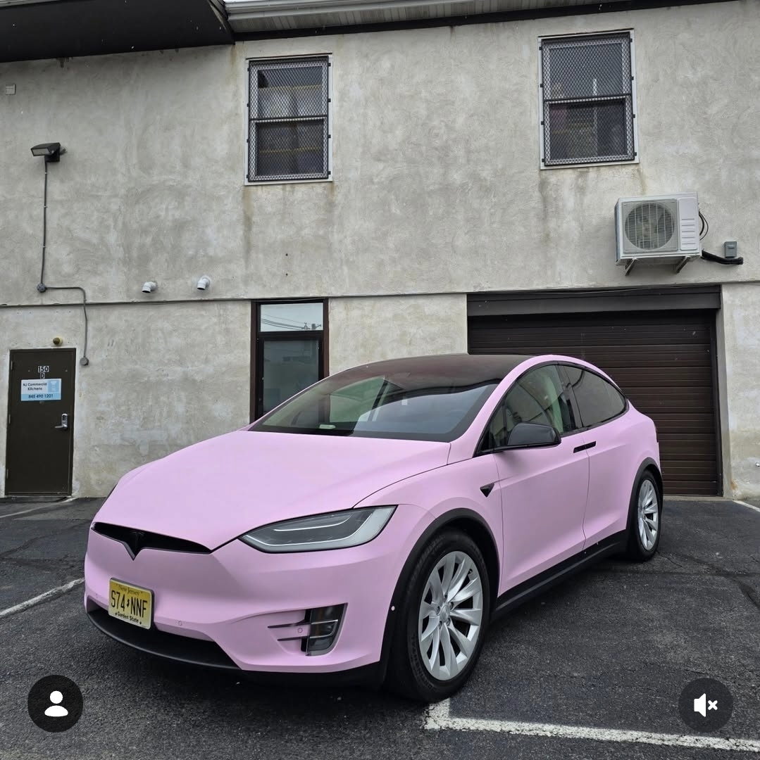 Pink Tesla Model X wrapped in KPMF vinyl