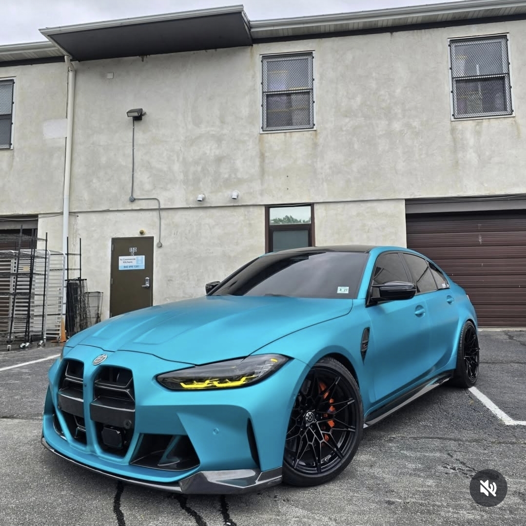 Satin teal BMW M3 wrapped in KPMF vinyl