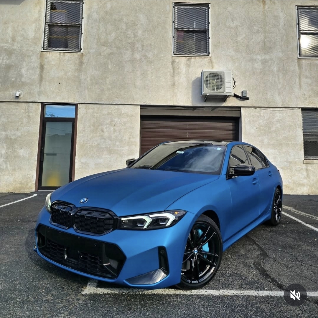 Matte blue BMW 3 Series wrapped in KPMF vinyl